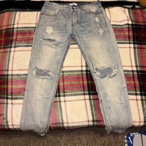 Men's Distressed Light Blue Jeans